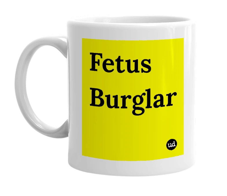 White mug with 'Fetus Burglar' in bold black letters