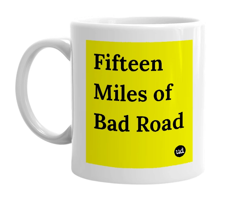 White mug with 'Fifteen Miles of Bad Road' in bold black letters