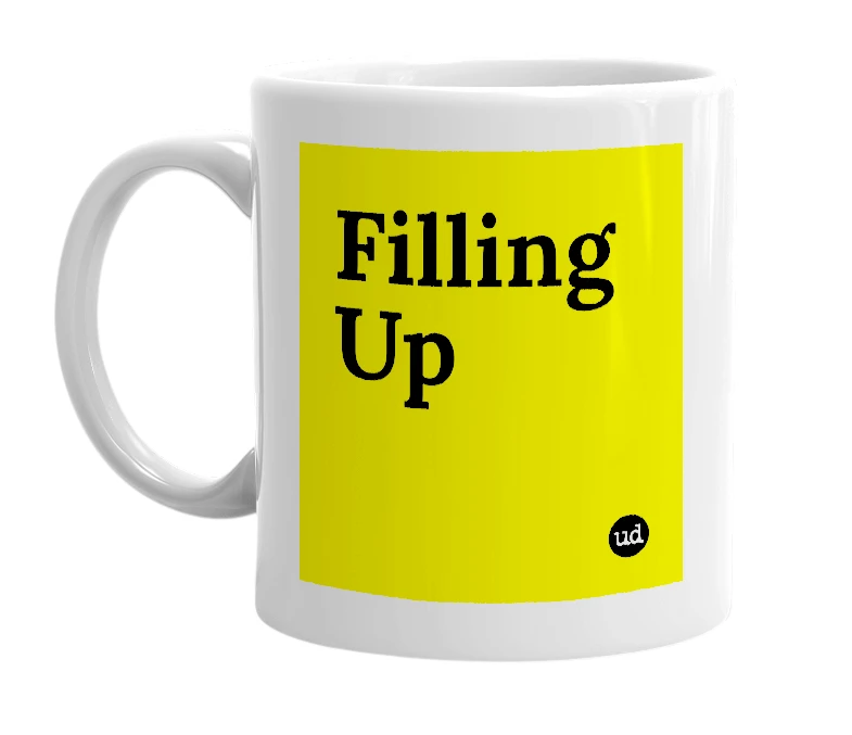 White mug with 'Filling Up' in bold black letters