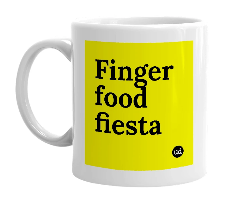 White mug with 'Finger food fiesta' in bold black letters