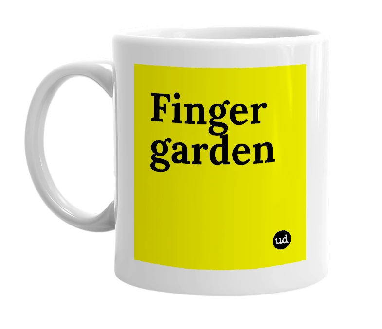 White mug with 'Finger garden' in bold black letters