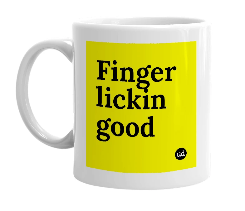 White mug with 'Finger lickin good' in bold black letters