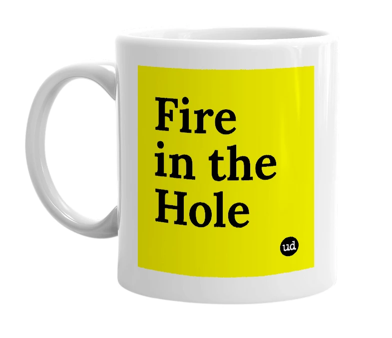 White mug with 'Fire in the Hole' in bold black letters