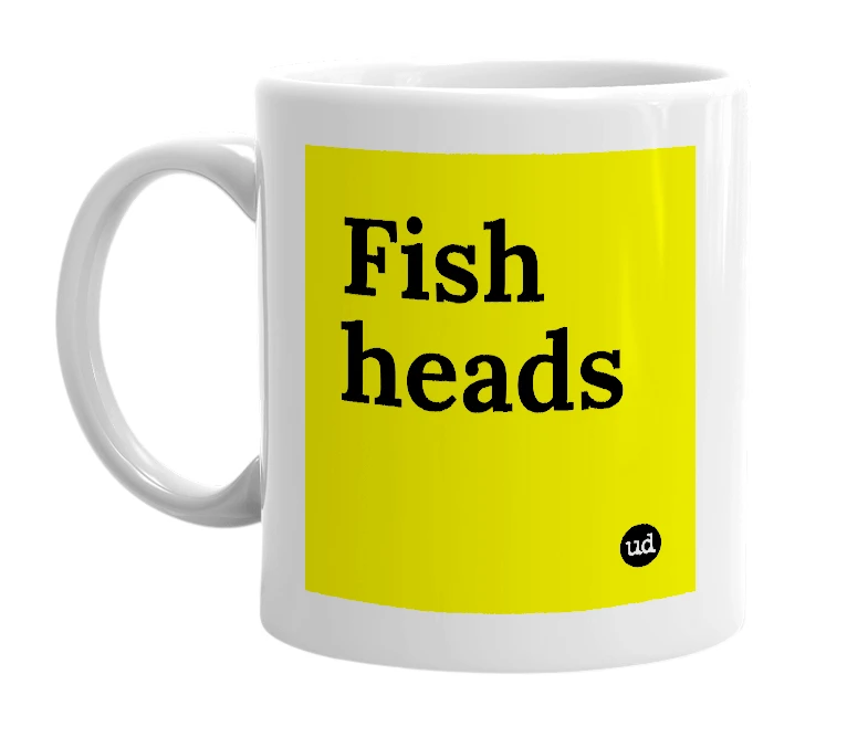 White mug with 'Fish heads' in bold black letters