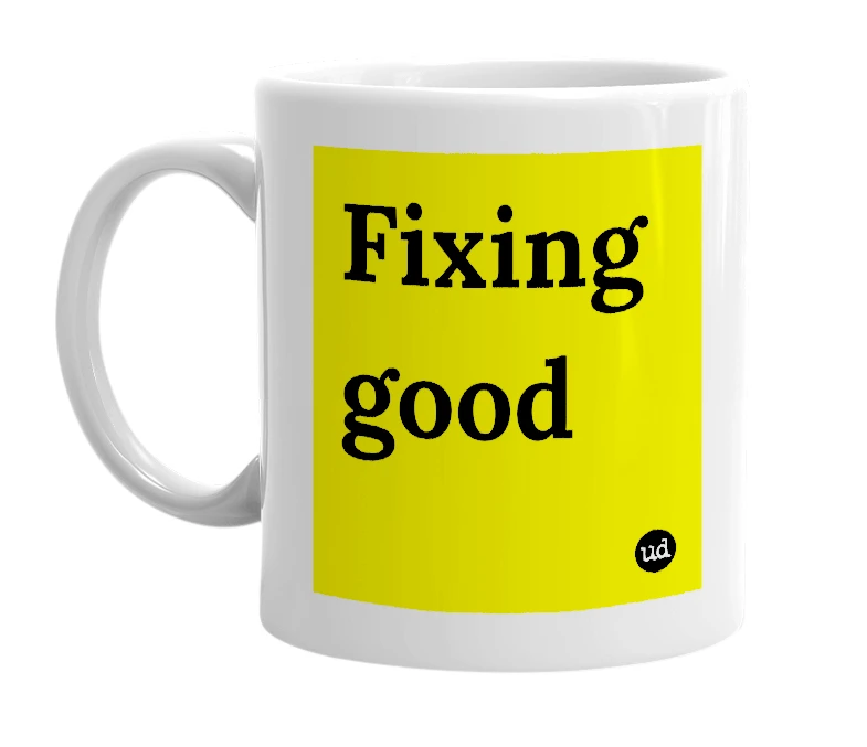 White mug with 'Fixing good' in bold black letters