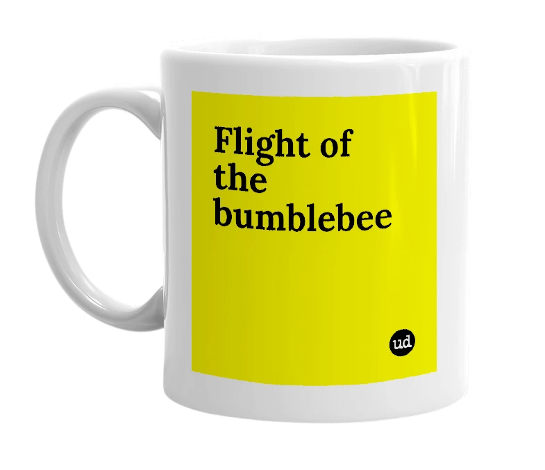 White mug with 'Flight of the bumblebee' in bold black letters