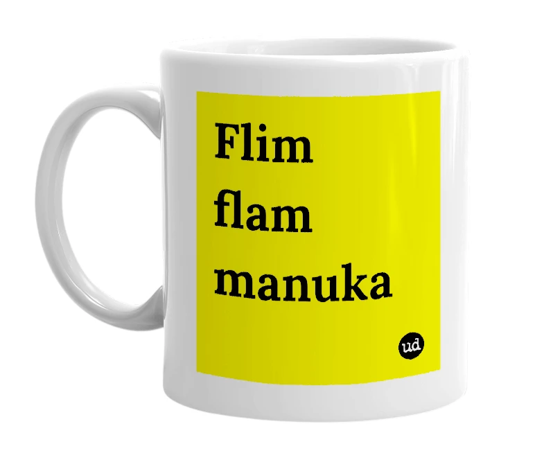 White mug with 'Flim flam manuka' in bold black letters