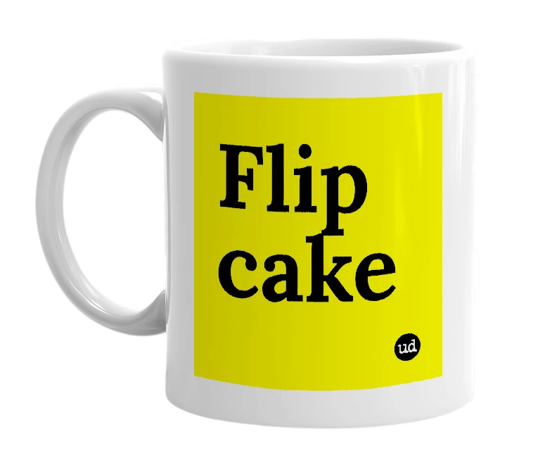 White mug with 'Flip cake' in bold black letters