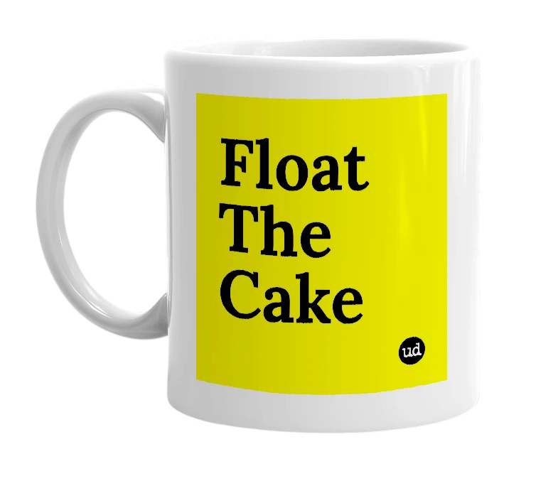 White mug with 'Float The Cake' in bold black letters