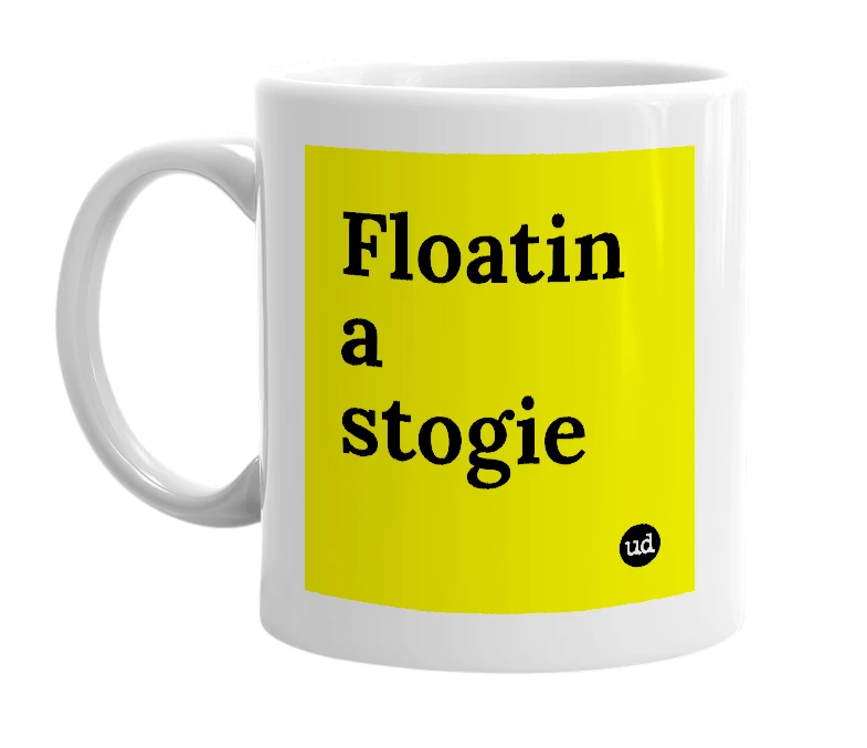 White mug with 'Floatin a stogie' in bold black letters
