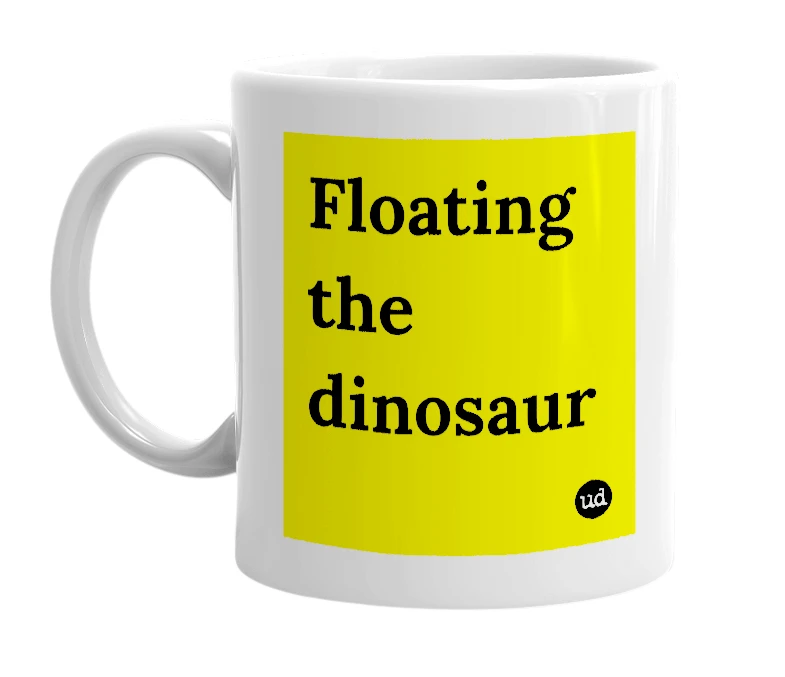 White mug with 'Floating the dinosaur' in bold black letters