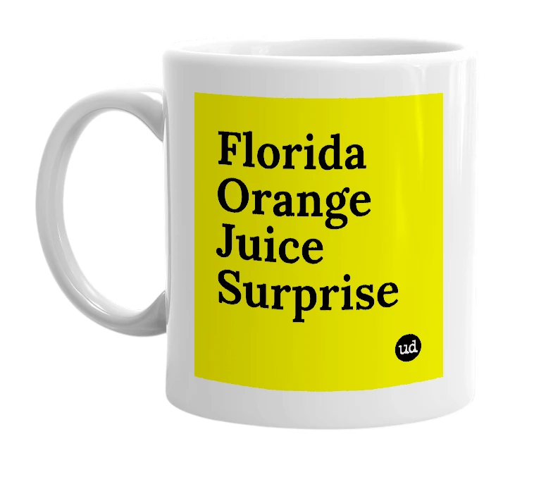 White mug with 'Florida Orange Juice Surprise' in bold black letters