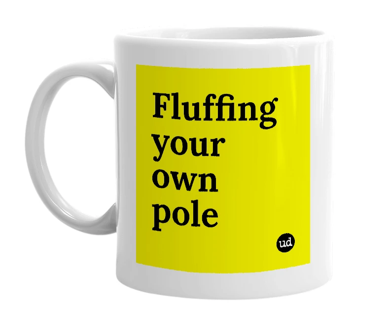 White mug with 'Fluffing your own pole' in bold black letters