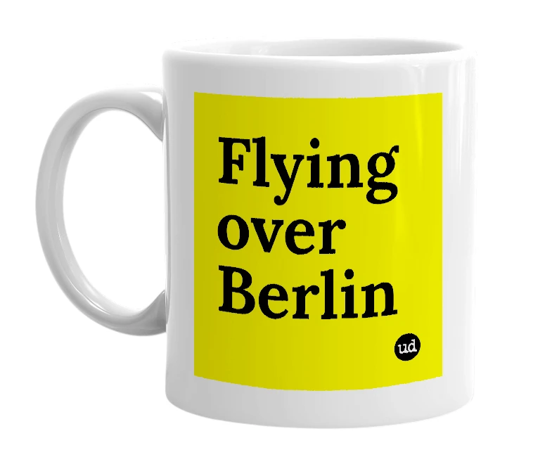 White mug with 'Flying over Berlin' in bold black letters