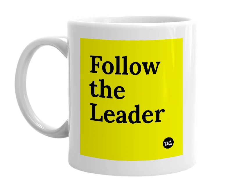 White mug with 'Follow the Leader' in bold black letters