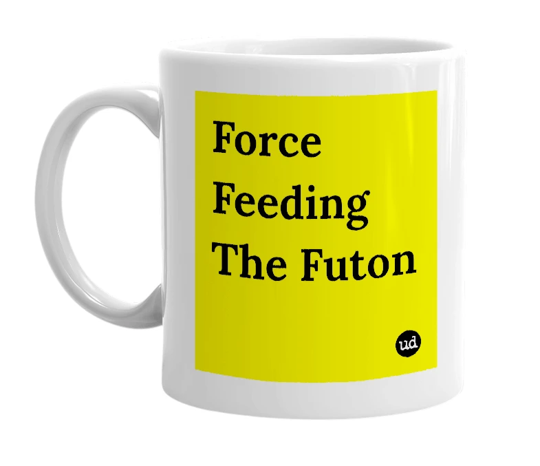 White mug with 'Force Feeding The Futon' in bold black letters
