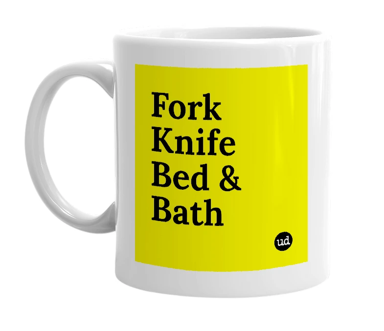 White mug with 'Fork Knife Bed & Bath' in bold black letters