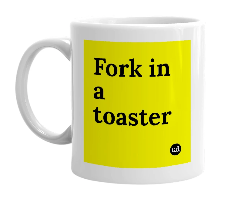 White mug with 'Fork in a toaster' in bold black letters