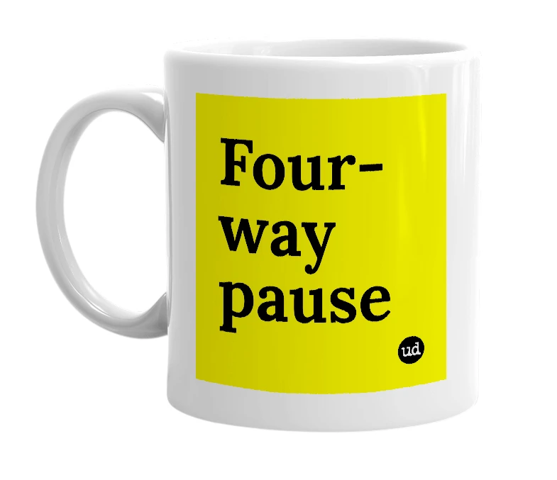 White mug with 'Four-way pause' in bold black letters