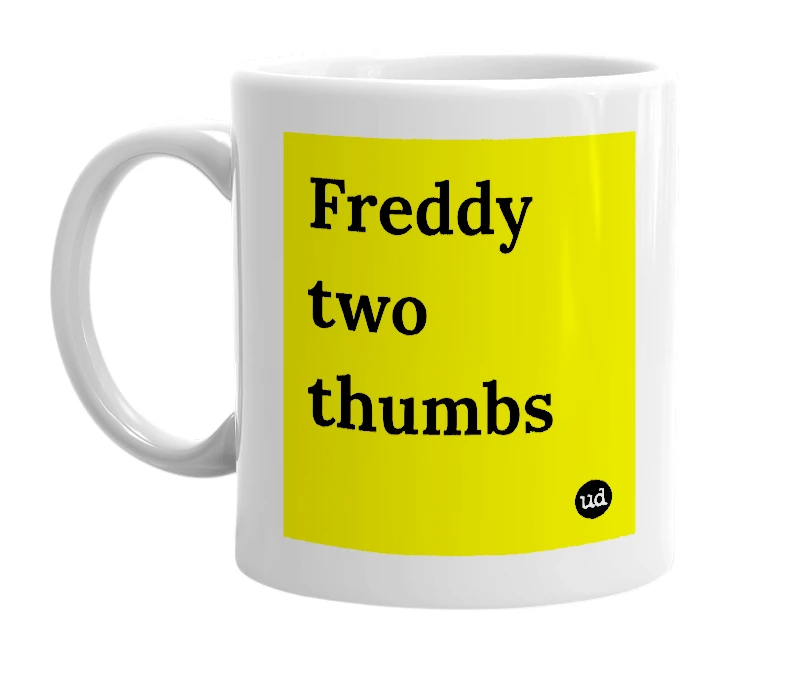 White mug with 'Freddy two thumbs' in bold black letters