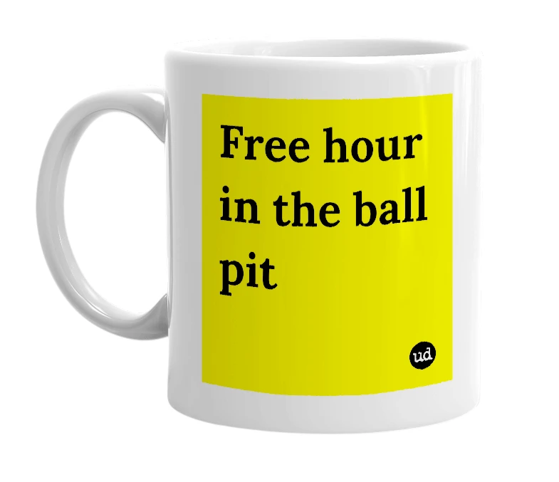 White mug with 'Free hour in the ball pit' in bold black letters