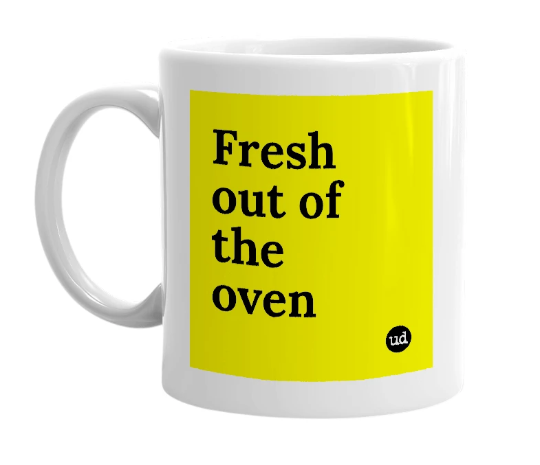 White mug with 'Fresh out of the oven' in bold black letters