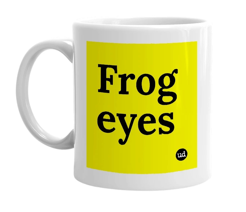 White mug with 'Frog eyes' in bold black letters