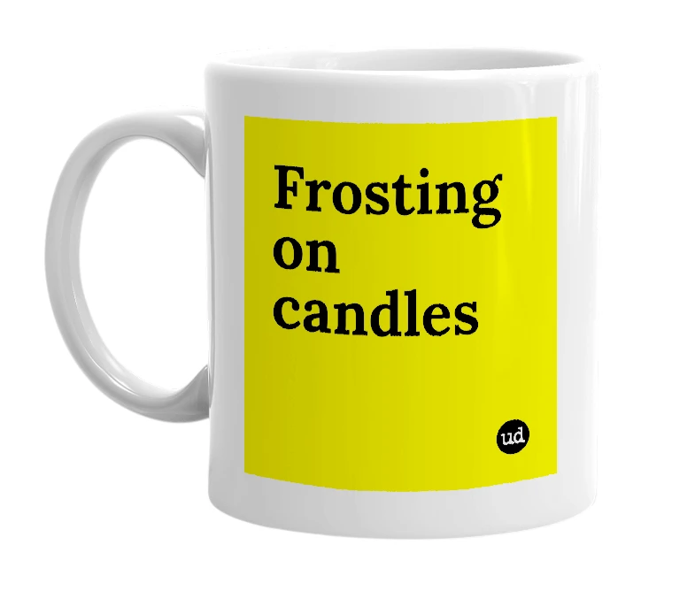 White mug with 'Frosting on candles' in bold black letters