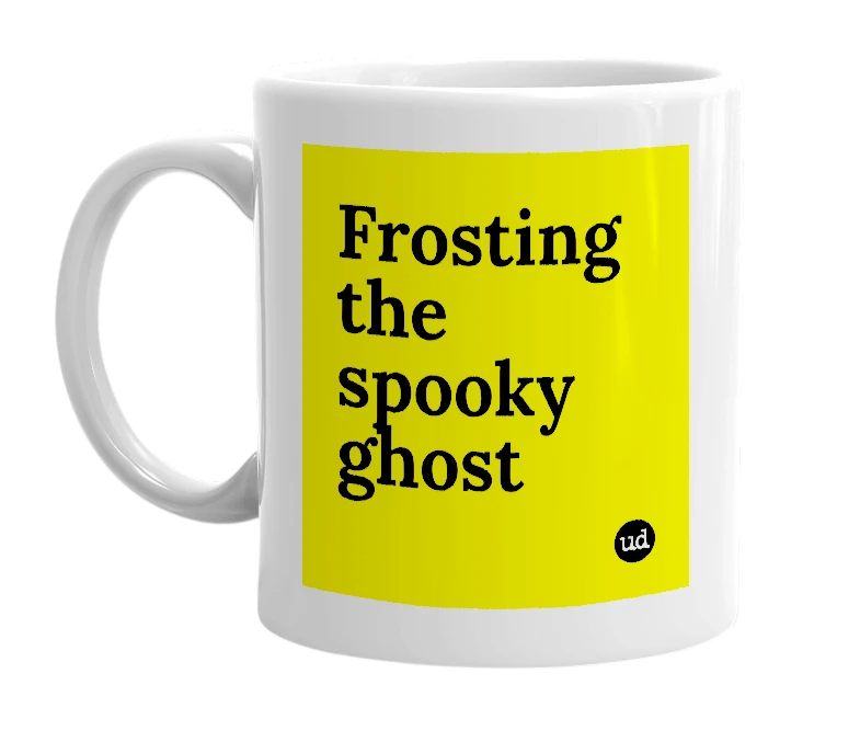 White mug with 'Frosting the spooky ghost' in bold black letters