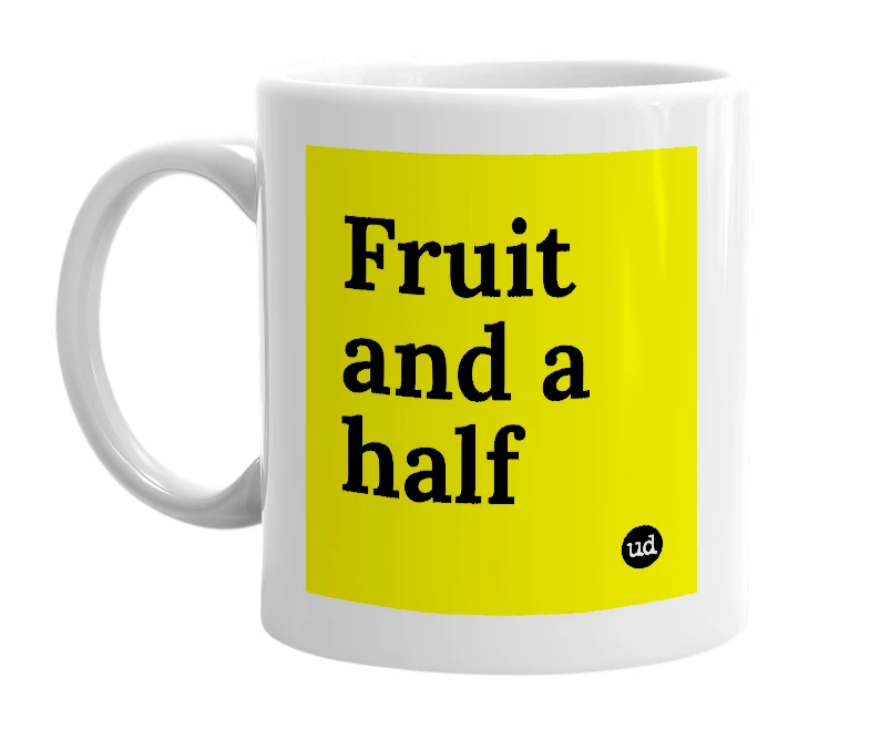 White mug with 'Fruit and a half' in bold black letters