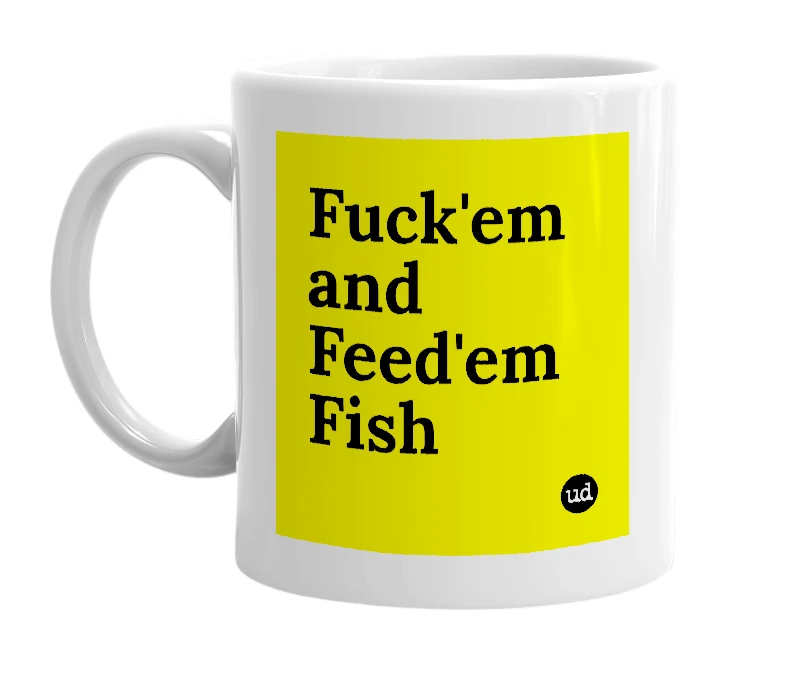 White mug with 'Fuck'em and Feed'em Fish' in bold black letters