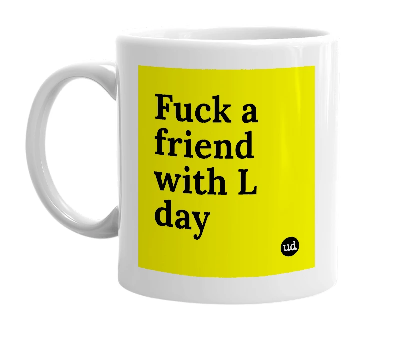 White mug with 'Fuck a friend with L day' in bold black letters