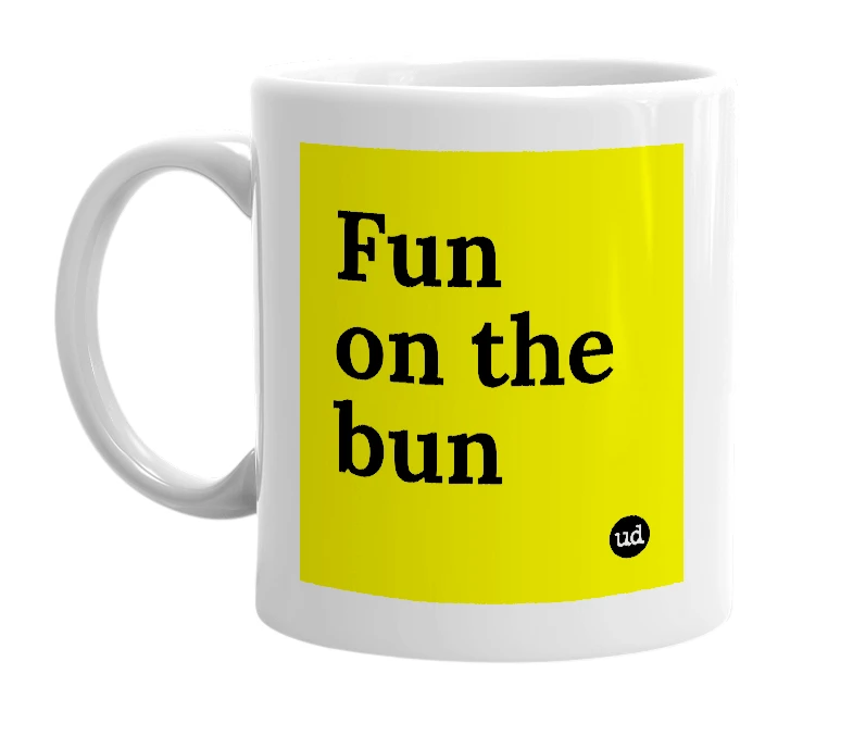 White mug with 'Fun on the bun' in bold black letters