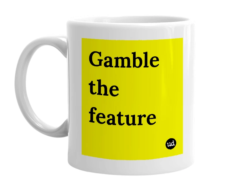 White mug with 'Gamble the feature' in bold black letters