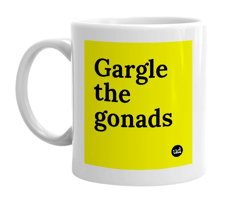 White mug with 'Gargle the gonads' in bold black letters