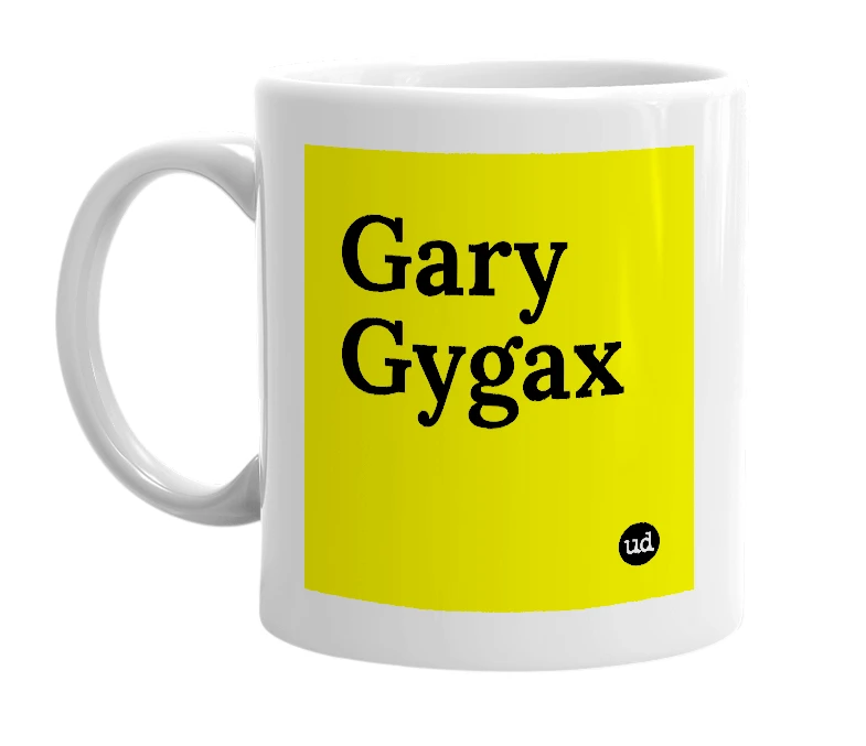 White mug with 'Gary Gygax' in bold black letters