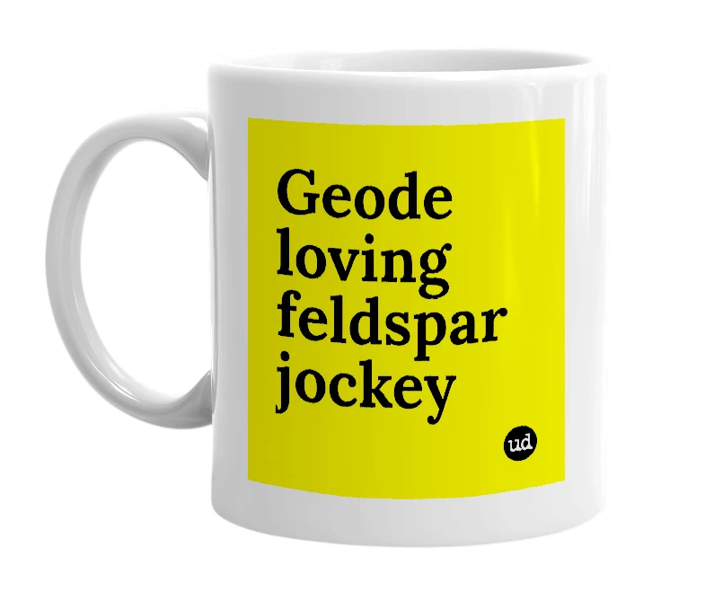 White mug with 'Geode loving feldspar jockey' in bold black letters