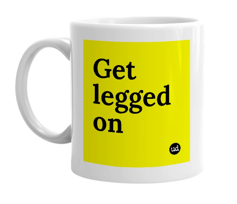 White mug with 'Get legged on' in bold black letters