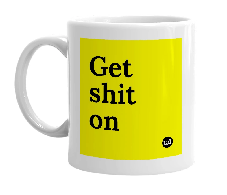 White mug with 'Get shit on' in bold black letters