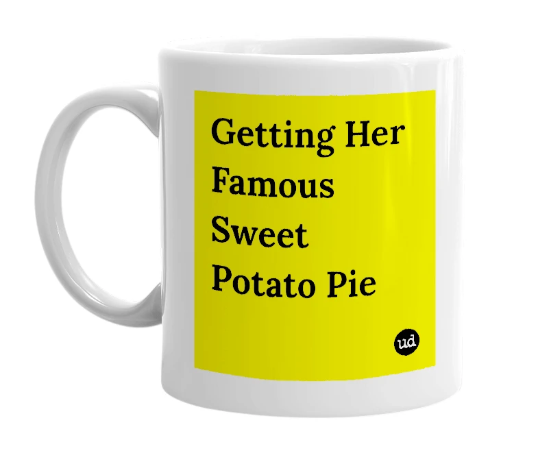 White mug with 'Getting Her Famous Sweet Potato Pie' in bold black letters