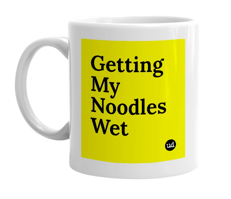 White mug with 'Getting My Noodles Wet' in bold black letters