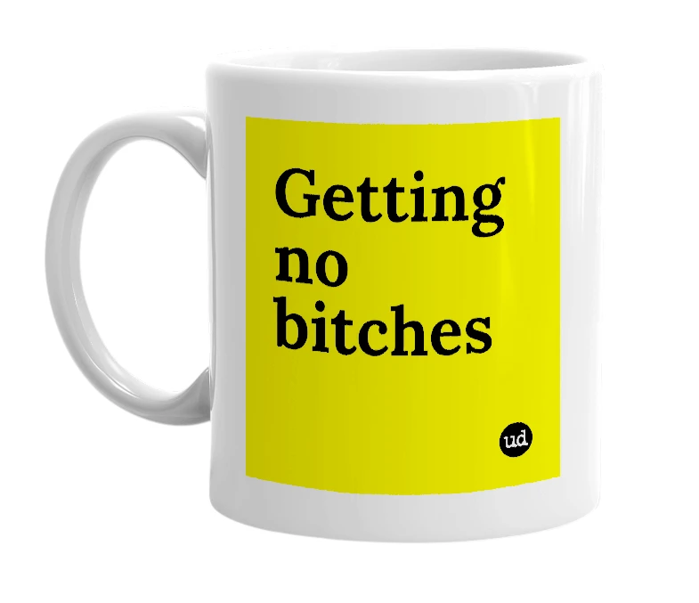 White mug with 'Getting no bitches' in bold black letters