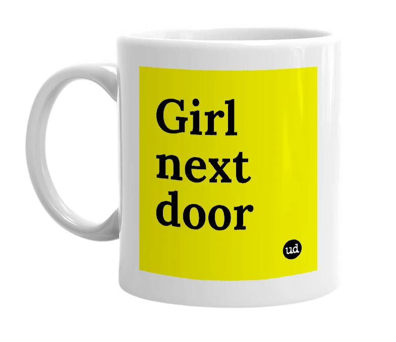 White mug with 'Girl next door' in bold black letters