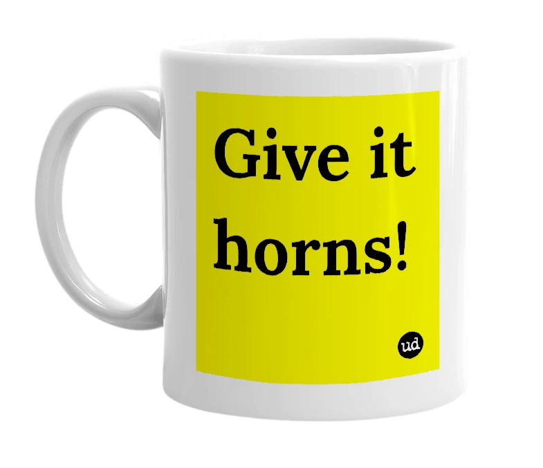 White mug with 'Give it horns!' in bold black letters