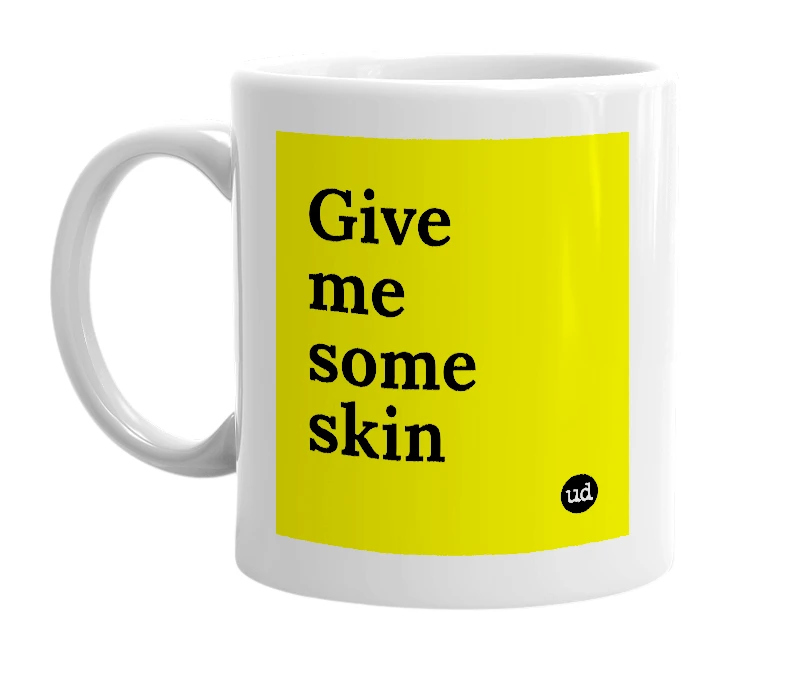 White mug with 'Give me some skin' in bold black letters