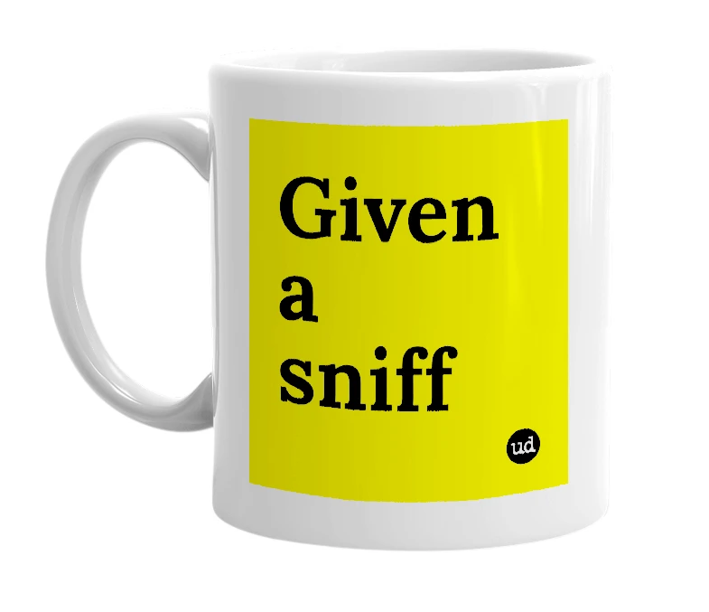 White mug with 'Given a sniff' in bold black letters