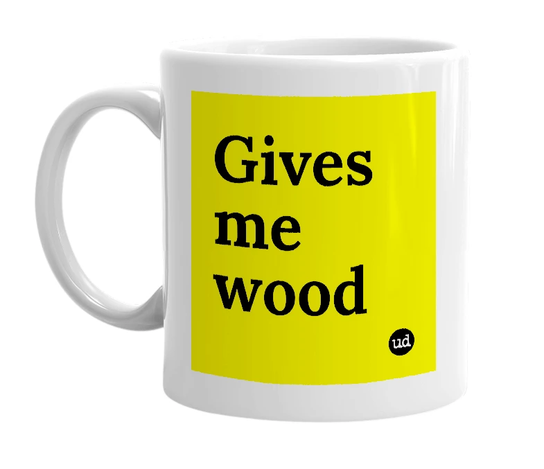 White mug with 'Gives me wood' in bold black letters