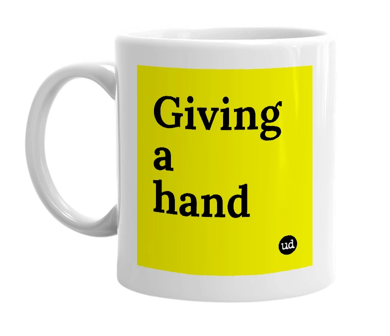 White mug with 'Giving a hand' in bold black letters