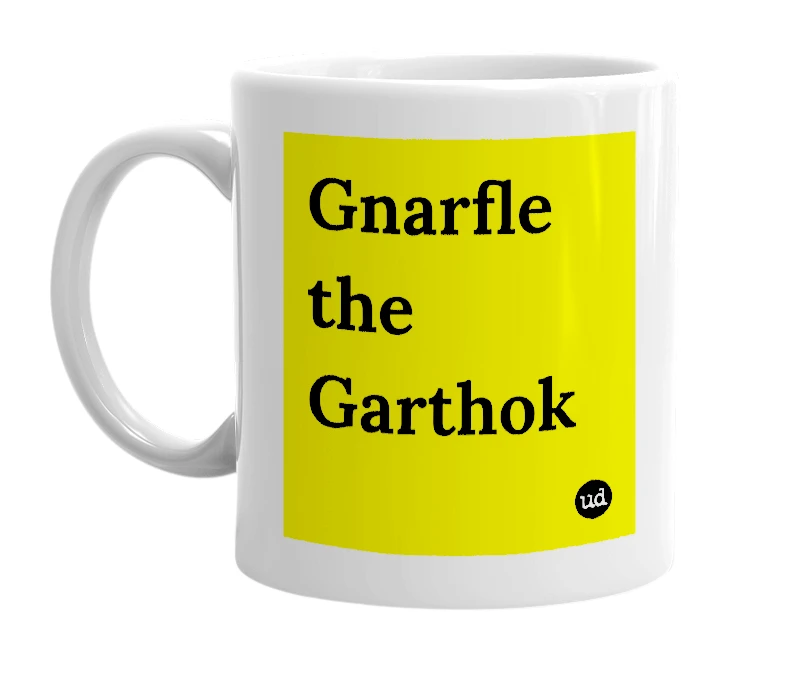 White mug with 'Gnarfle the Garthok' in bold black letters
