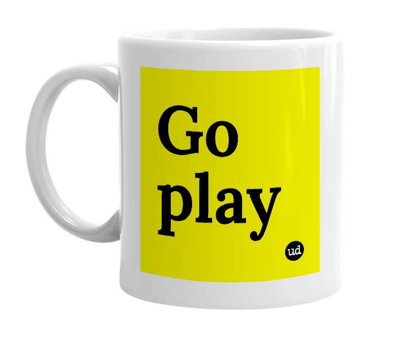 White mug with 'Go play' in bold black letters